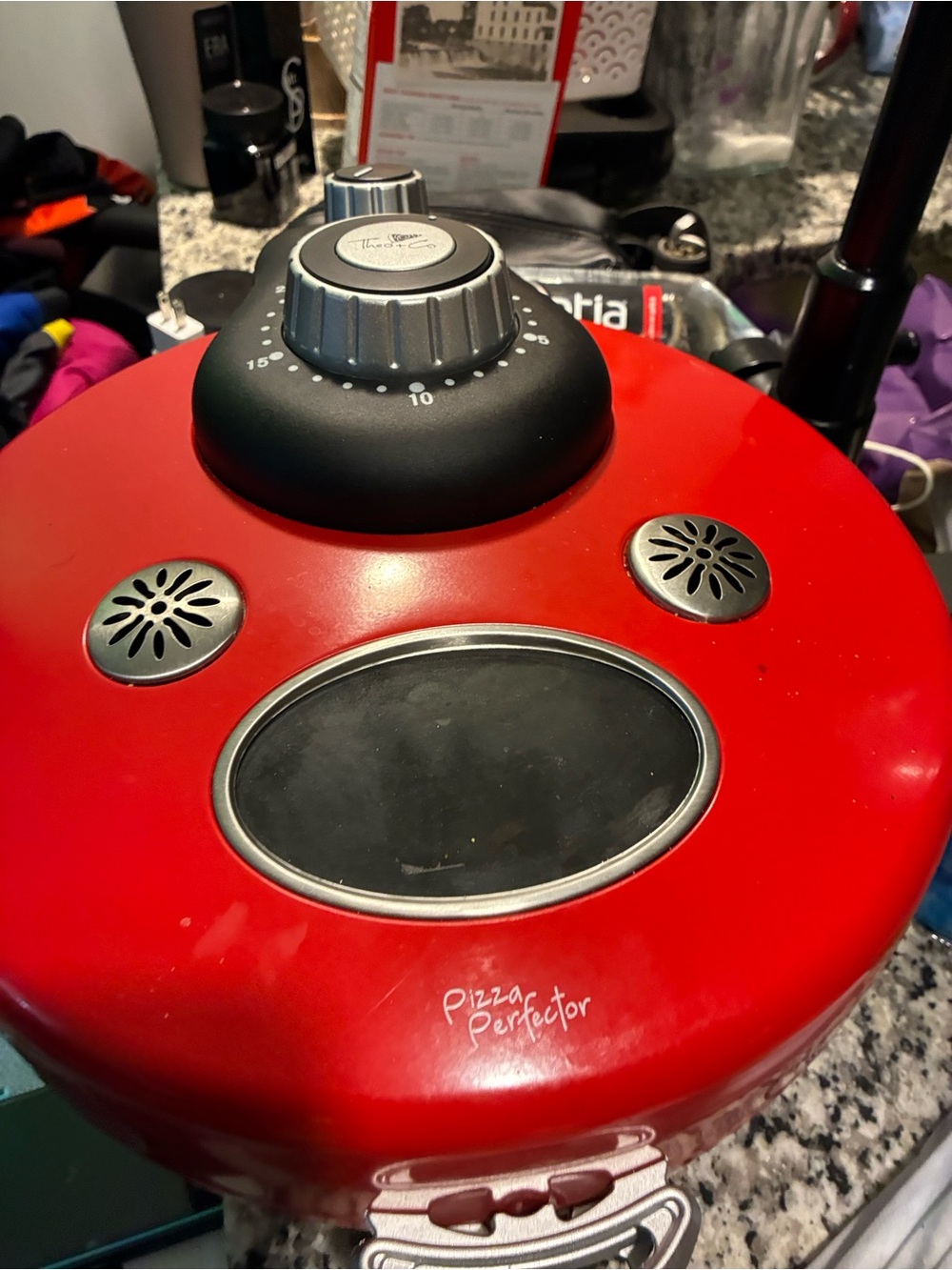 Red Portable Pizza Maker works Peru and great without using over